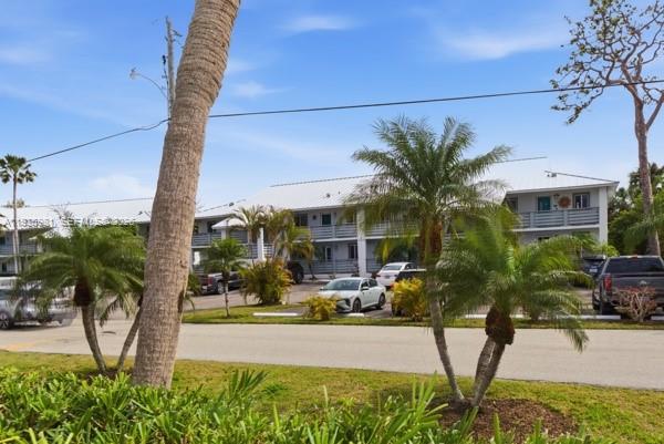 a view of balcony with potted plants