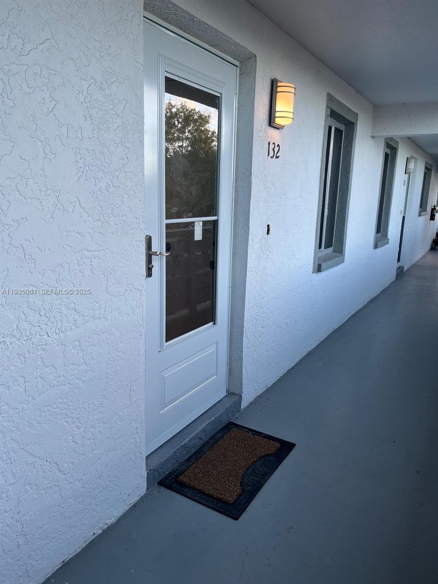 6800 Placida Road, Unit 132 Englewood, FL 34224 - Photo 2 of 33 Front Entrance with new Storm door and New entry door.