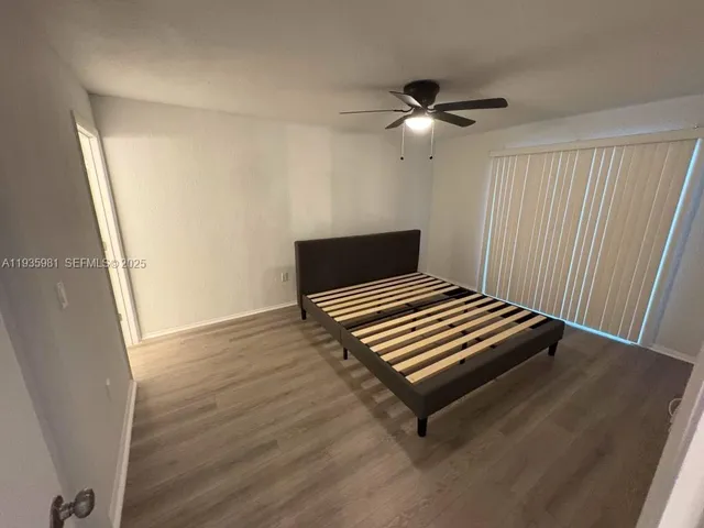 a spacious bathroom with a double vanity sink mirror and toilet