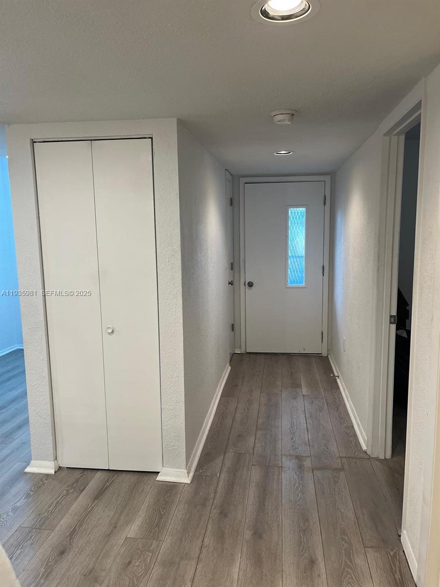 6800 Placida Road, Unit 132 Englewood, FL 34224 - Photo 6 of 33 Front entrance and hallway with pantry