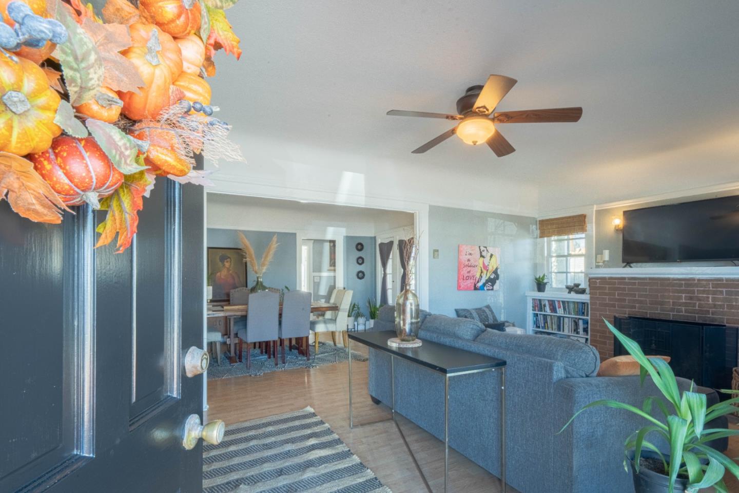 18 Chestnut Street Salinas, CA 93901 - Photo 4 of 32 a living room with fireplace furniture and a flat screen tv
