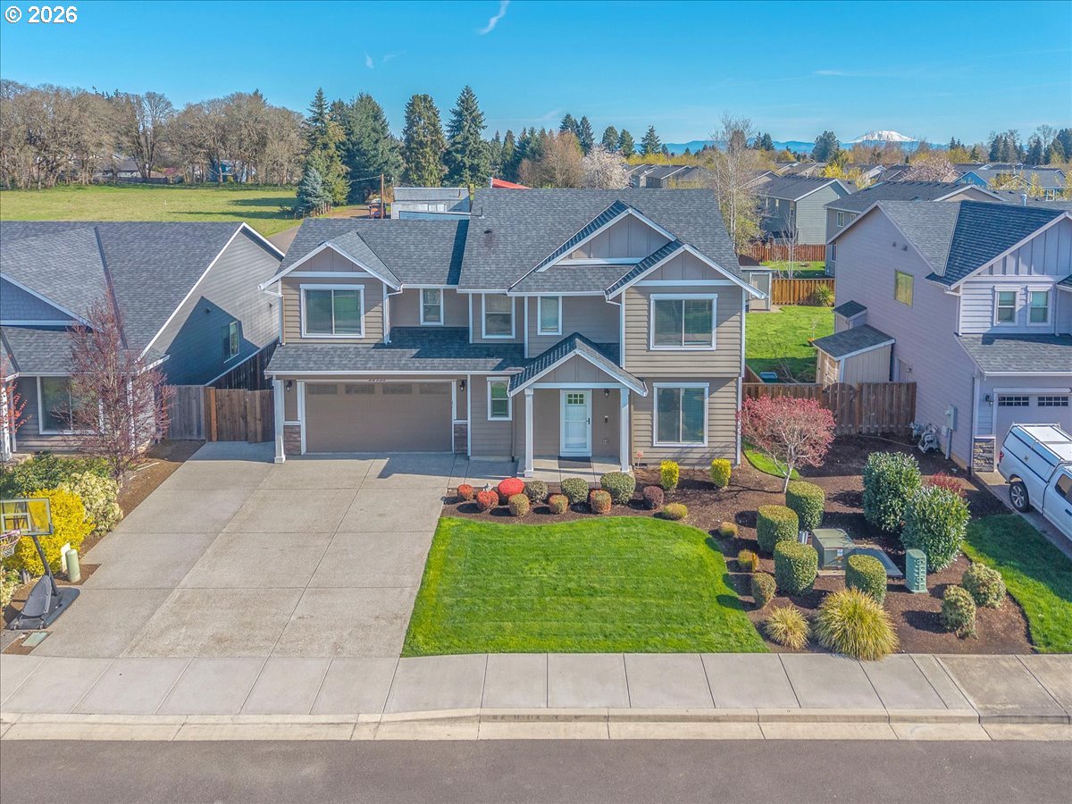 33955 Southeast Vine Street Scappoose, OR 97056 - Photo 1 of 44 a front view of house with yard