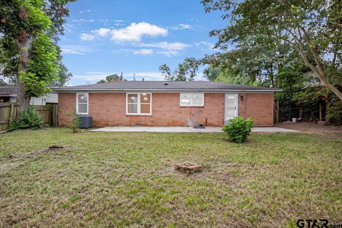 2308 Lingner Drive Tyler, TX 75701 - Photo 23 of 27 a front view of house with yard and green space