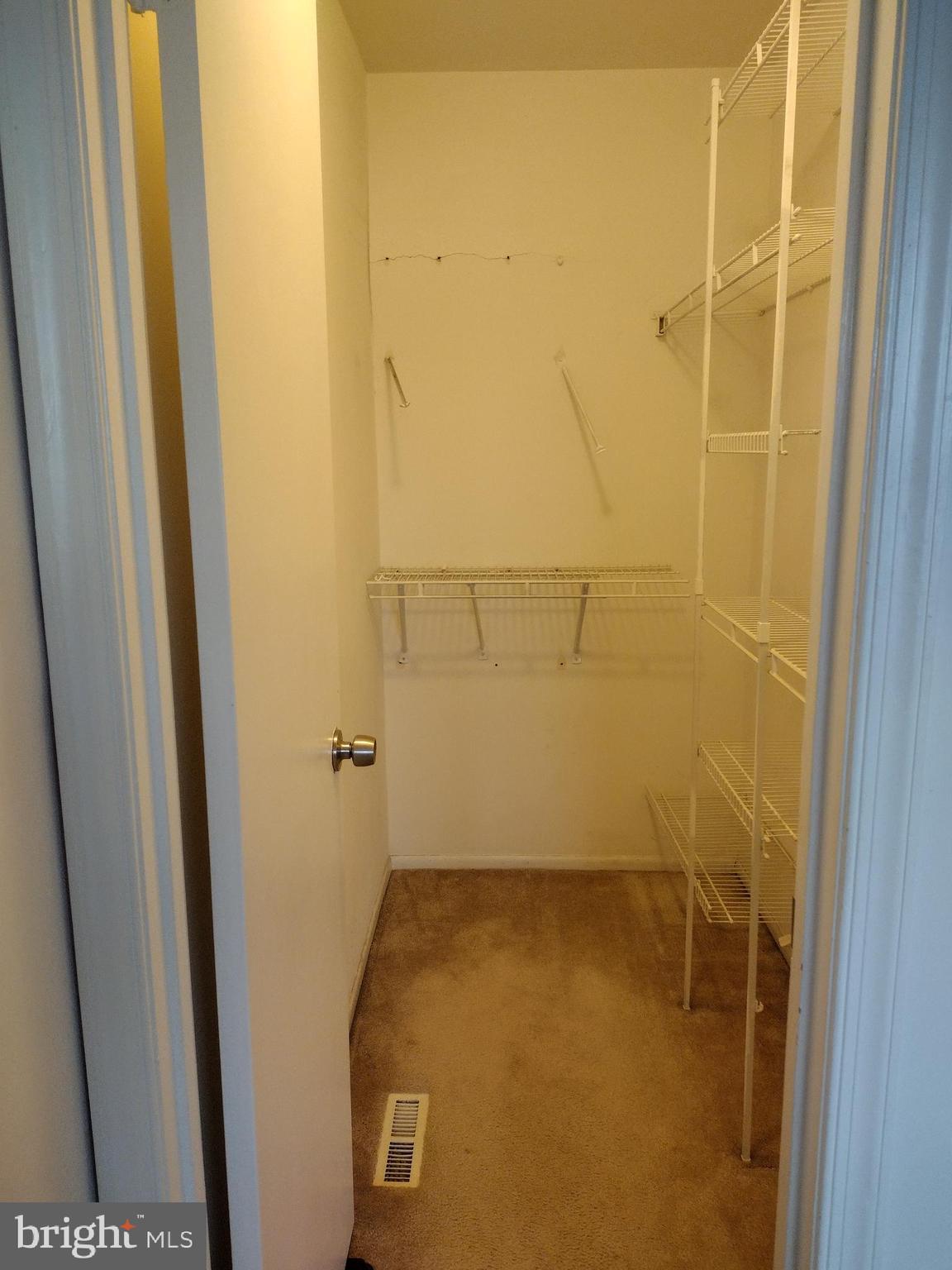 6913 Rockfield Road Baltimore, MD 21244 - Photo 14 of 31 master bedroom walk in closet