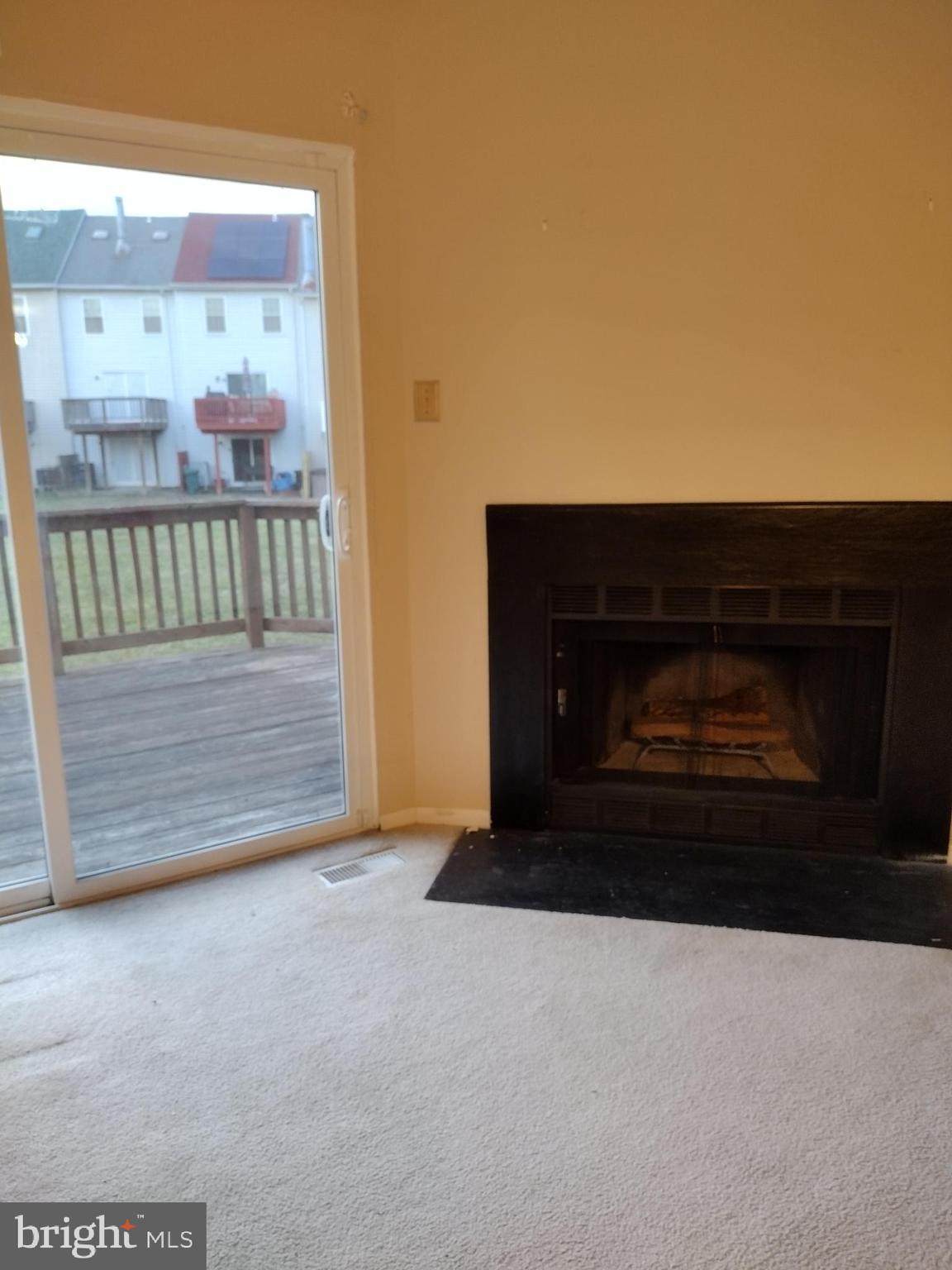 6913 Rockfield Road Baltimore, MD 21244 - Photo 3 of 31 living room with fireplace
