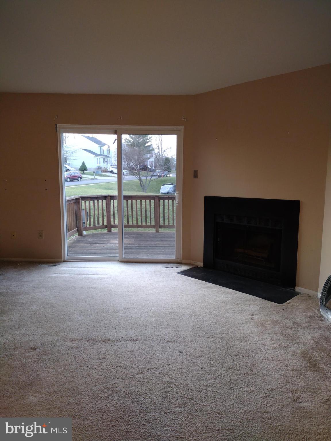 6913 Rockfield Road Baltimore, MD 21244 - Photo 31 of 31 living room with fireplace