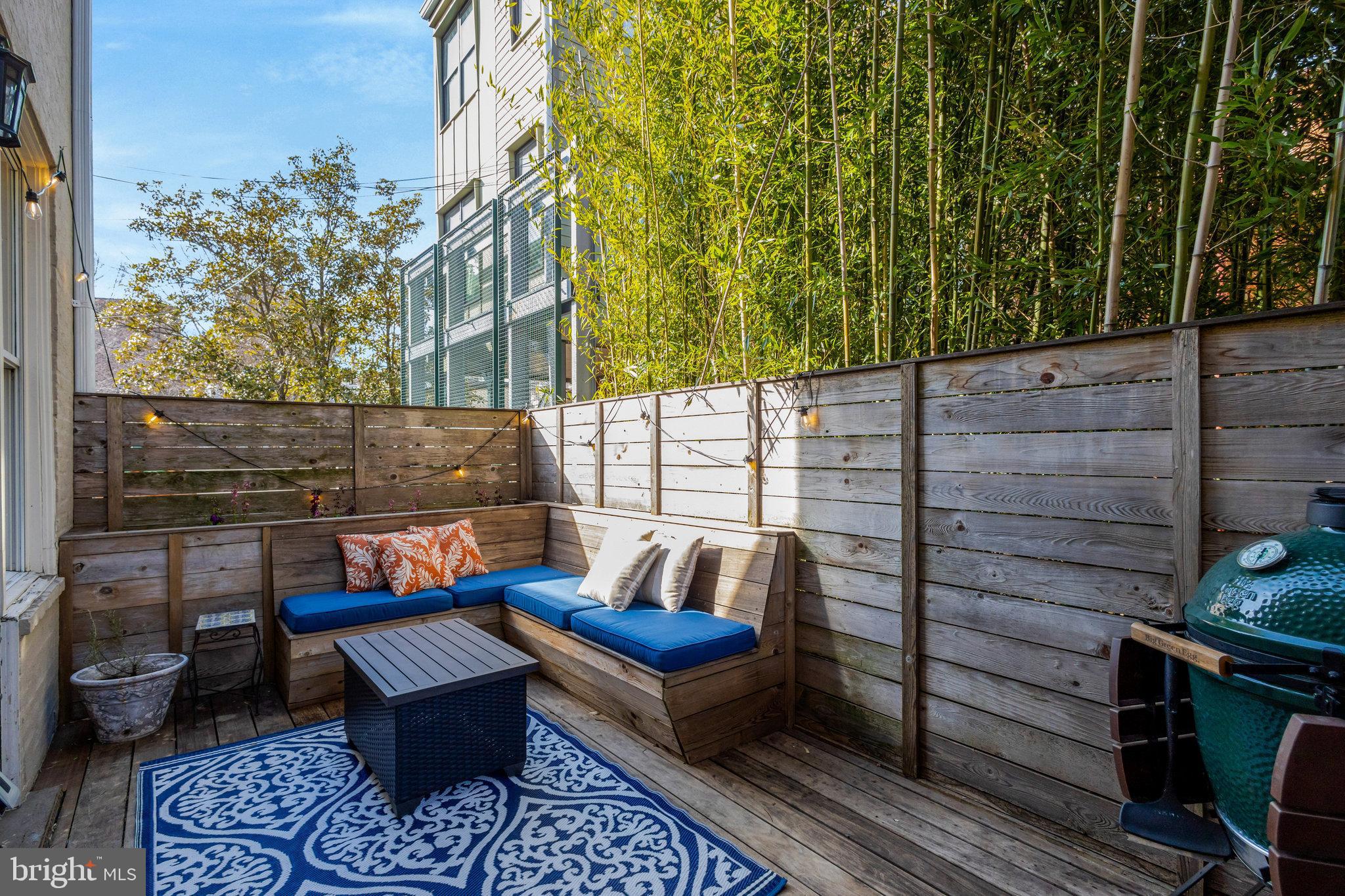 11 6th Street Southeast Washington, DC 20003 - Photo 19 of 48 a backyard of a house with outdoor seating