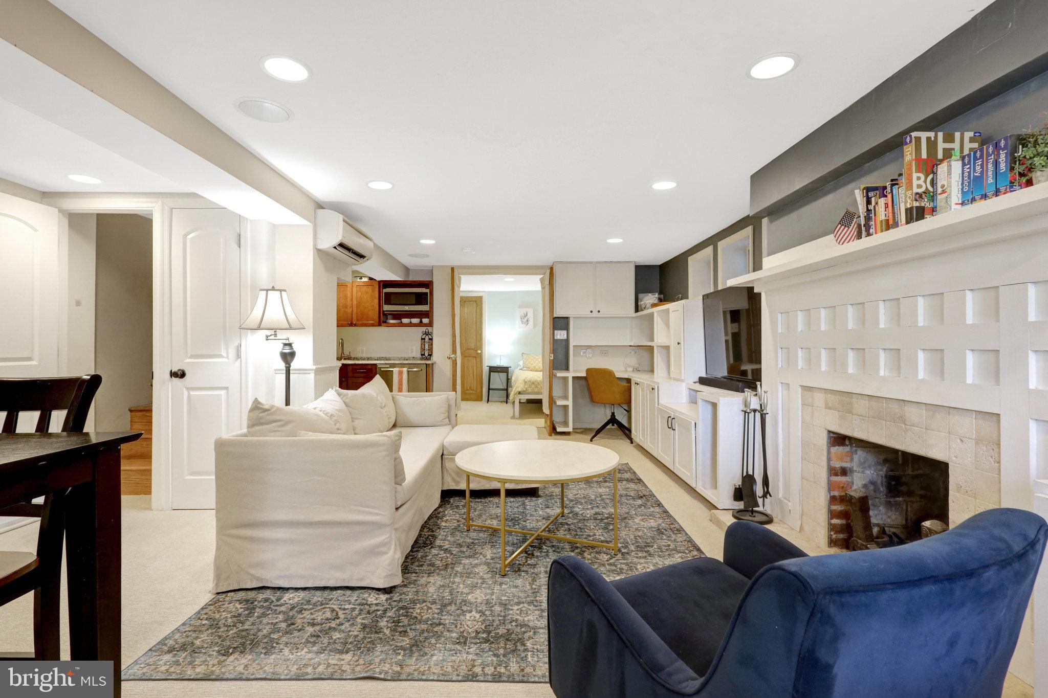 11 6th Street Southeast Washington, DC 20003 - Photo 36 of 48 a living room with furniture fireplace and flat screen tv
