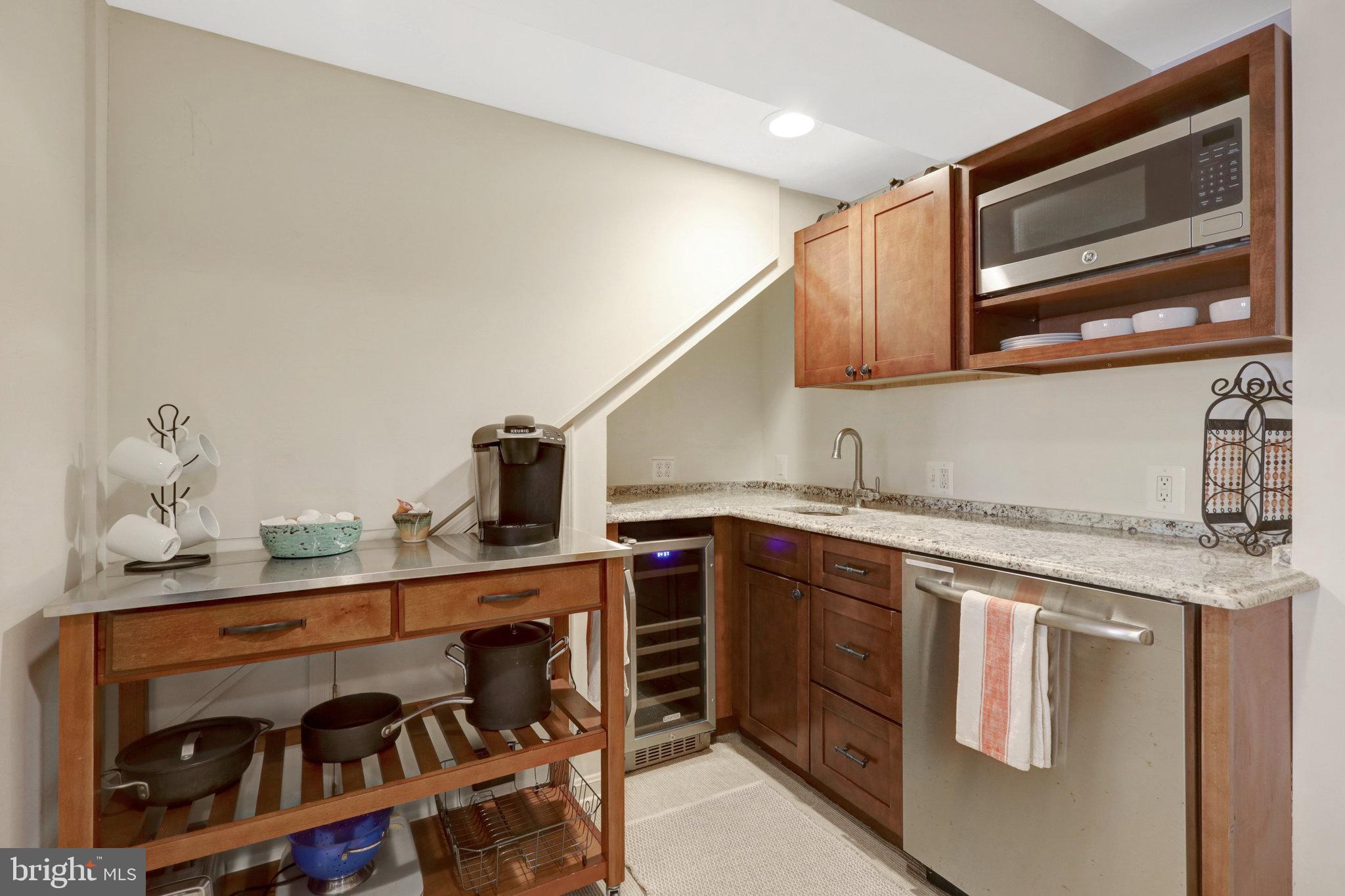 11 6th Street Southeast Washington, DC 20003 - Photo 37 of 48 a kitchen with a sink and cabinets