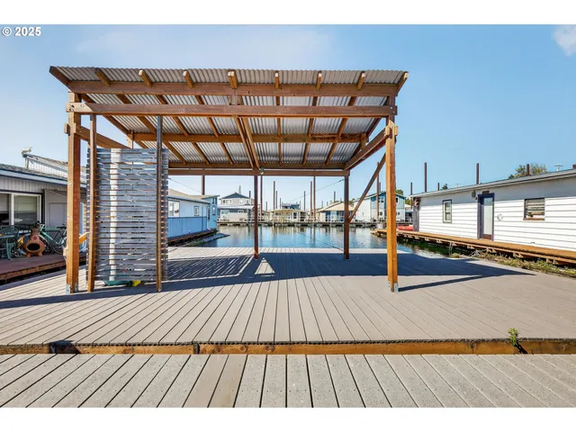 a view of swimming pool with a seating space