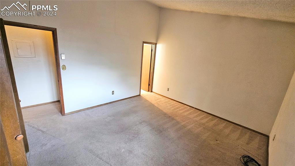401 Forest Edge Road, Unit B8 Woodland Park, CO 80863 - Photo 18 of 19 an empty room with windows