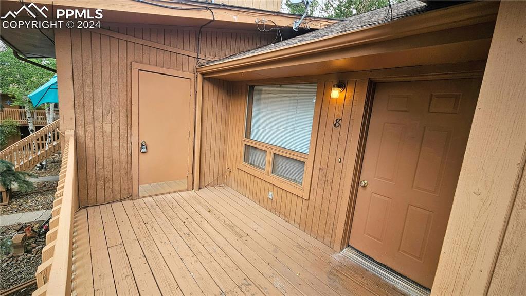 401 Forest Edge Road, Unit B8 Woodland Park, CO 80863 - Photo 2 of 19 a view of a hallway with wooden floor and entryway