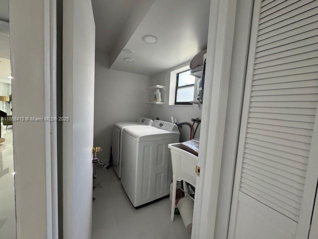 9709 North New River Canal Road, Unit 207 Plantation, FL 33324 - Photo 14 of 18 a utility room with dryer and washer