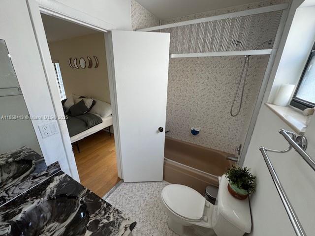 9709 North New River Canal Road, Unit 207 Plantation, FL 33324 - Photo 4 of 18 a bathroom with a sink toilet and shower