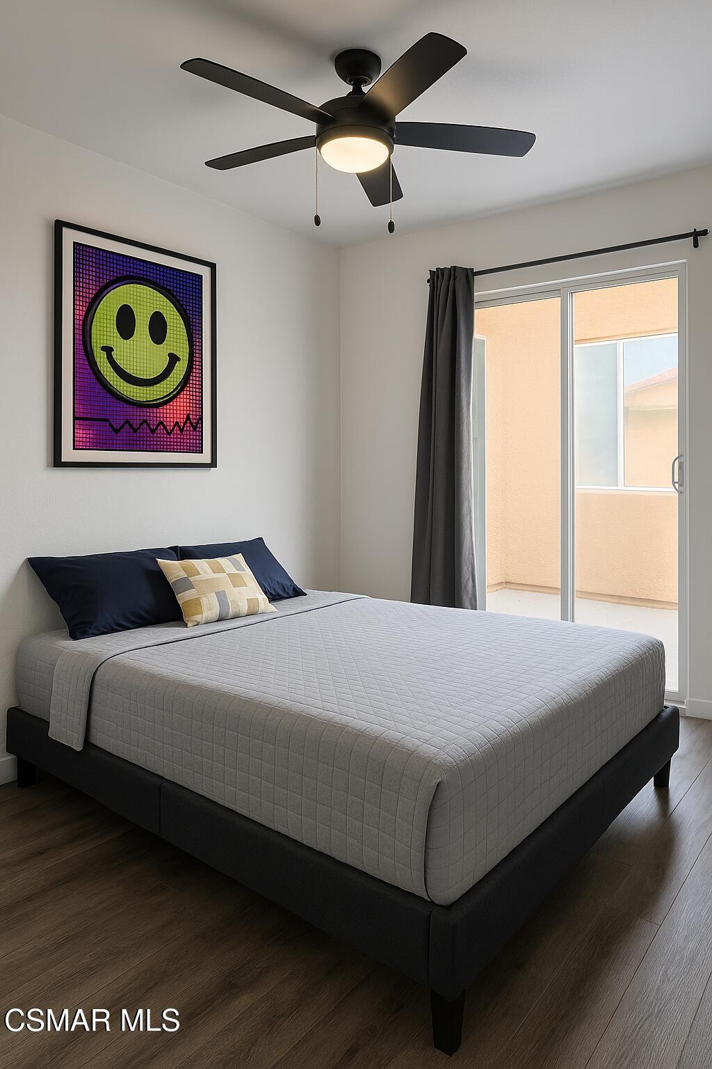 1212 Nautical Way Oxnard, CA 93030 - Photo 11 of 16 a bedroom with a bed and a painting on the wall