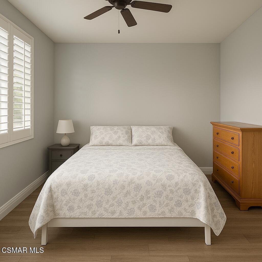 1212 Nautical Way Oxnard, CA 93030 - Photo 9 of 16 a bedroom with a bed and window