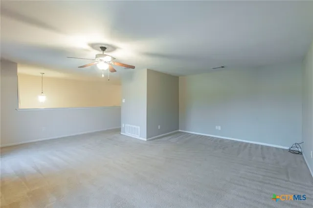 an empty room with a bathroom