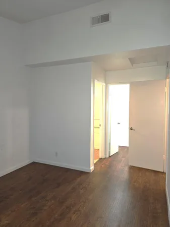 a view of an empty room and window