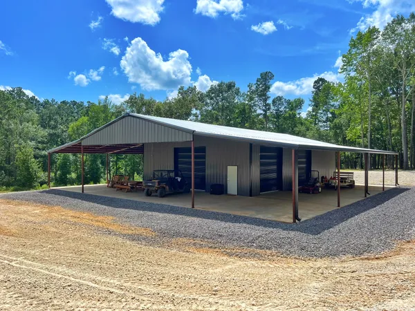 a view of a water heater room with a garage