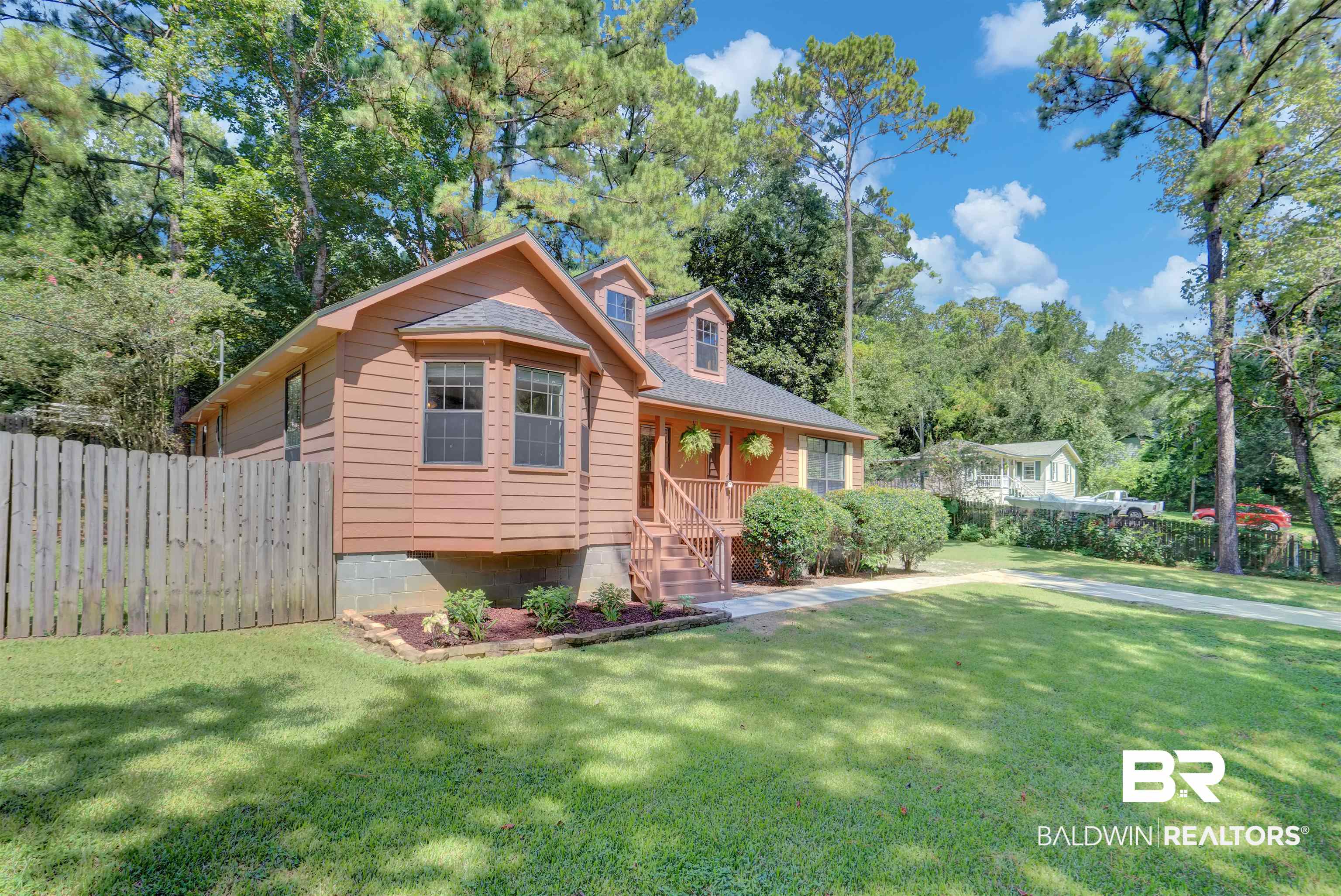 30871 Stanton Road Spanish Fort, AL 36527 - Photo 2 of 35 View of front of house featuring a front yard