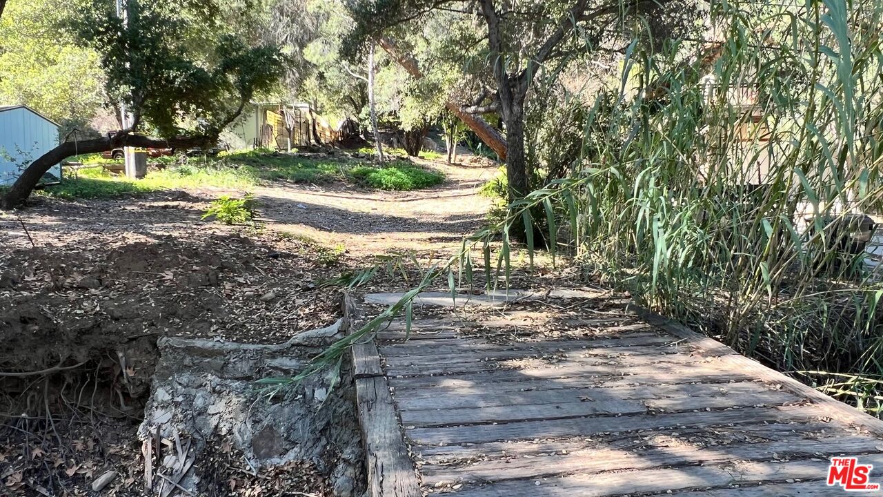 3485 Old Topanga Canyon Road Calabasas, CA 91302 - Photo 1 of 17 a view of a park with large trees