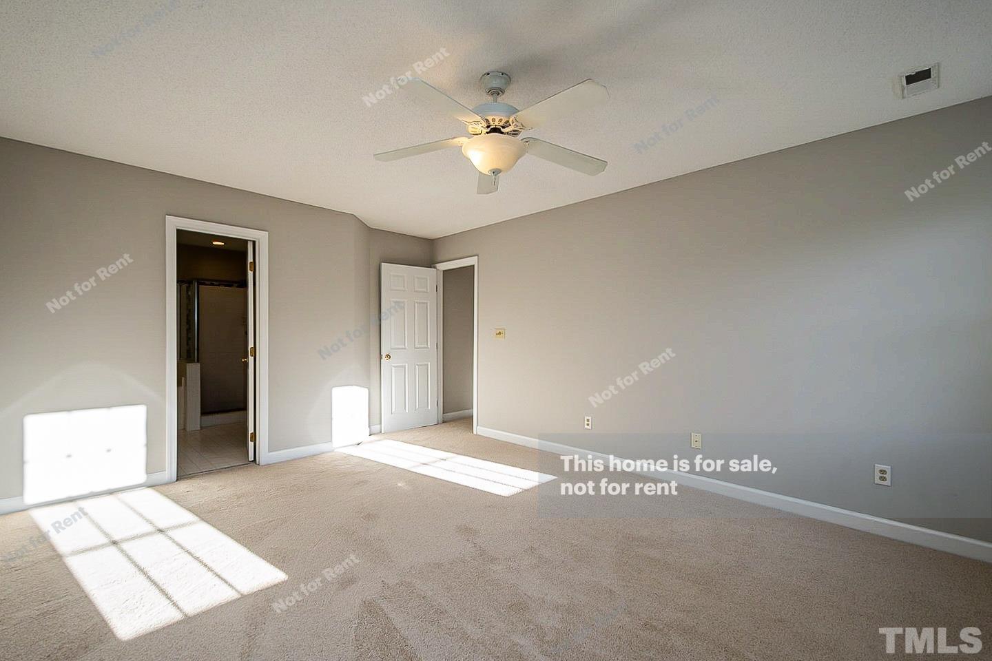 1945 Jupiter Hills Court Raleigh, NC 27604 - Photo 11 of 19 a view of a livingroom with a ceiling fan and window