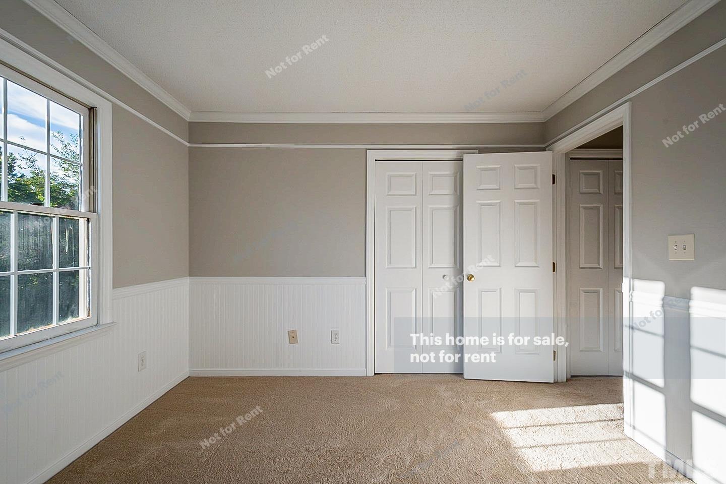 1945 Jupiter Hills Court Raleigh, NC 27604 - Photo 12 of 19 a view of an empty room with a window