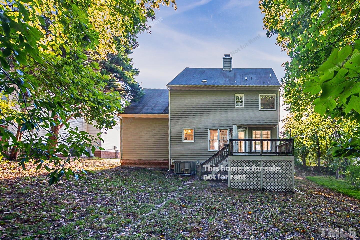 1945 Jupiter Hills Court Raleigh, NC 27604 - Photo 19 of 19 a front view of a house with a yard