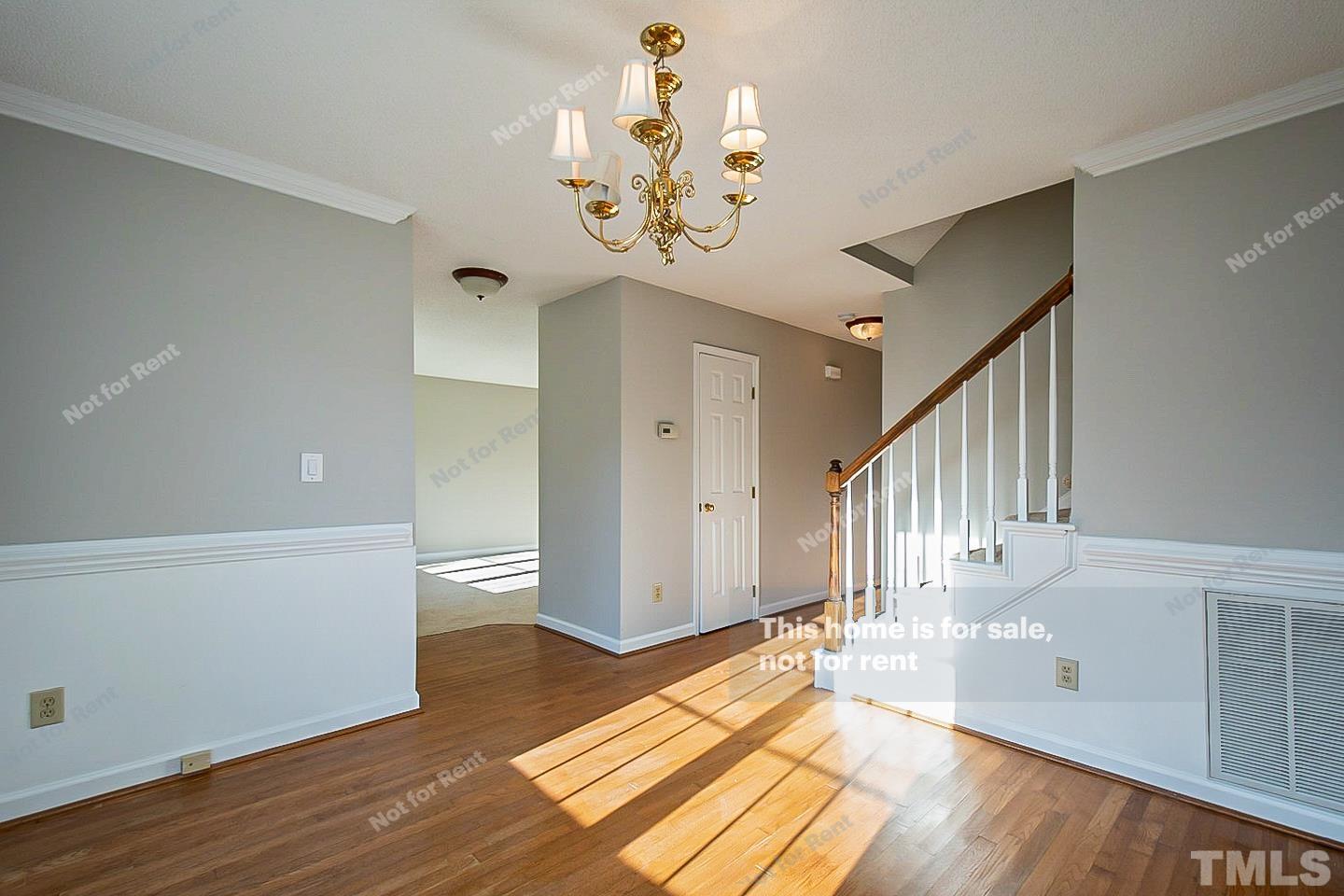1945 Jupiter Hills Court Raleigh, NC 27604 - Photo 7 of 19 a view of an entryway and wooden floor