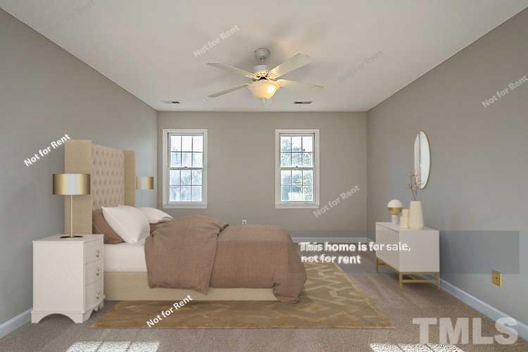 1945 Jupiter Hills Court Raleigh, NC 27604 - Photo 9 of 19 a living room with furniture and a window