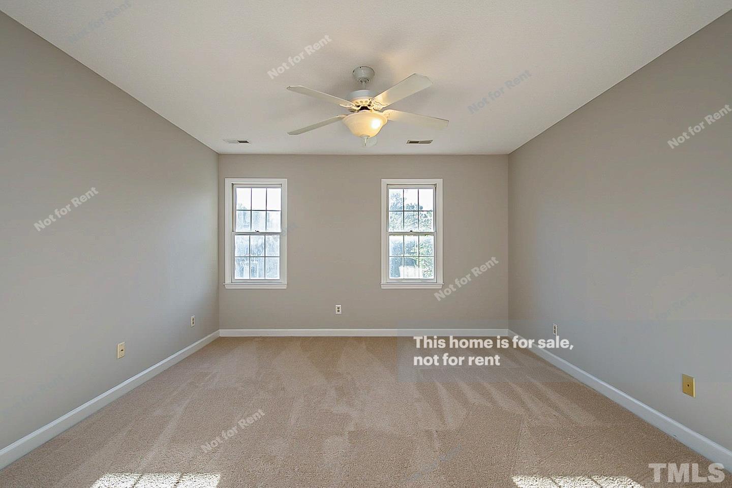 1945 Jupiter Hills Court Raleigh, NC 27604 - Photo 10 of 19 a view of an empty room with a window