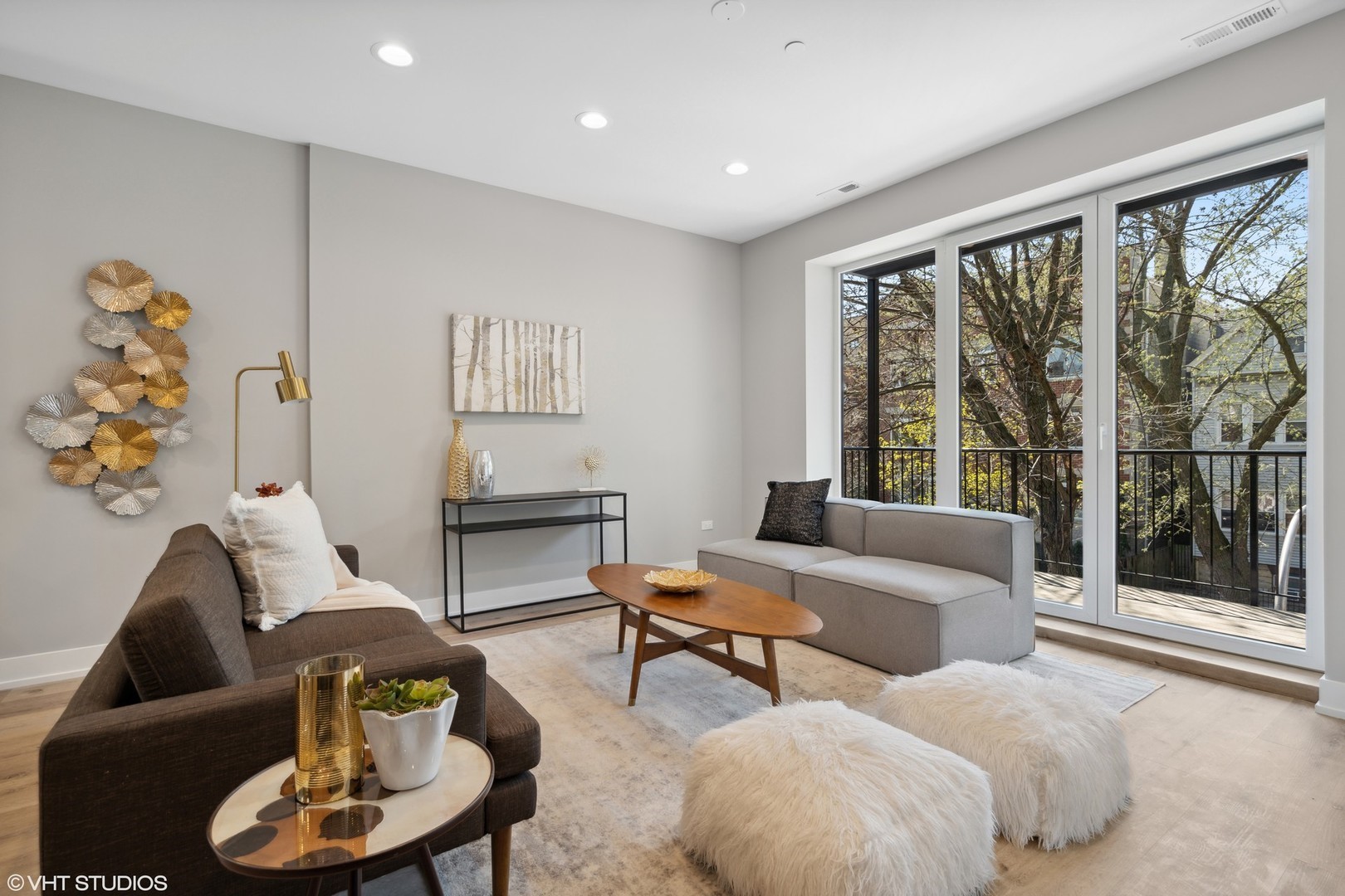 3335-3341 North Sheffield Avenue Chicago, IL 60657 - Photo 3 of 76 a living room with furniture and a large window