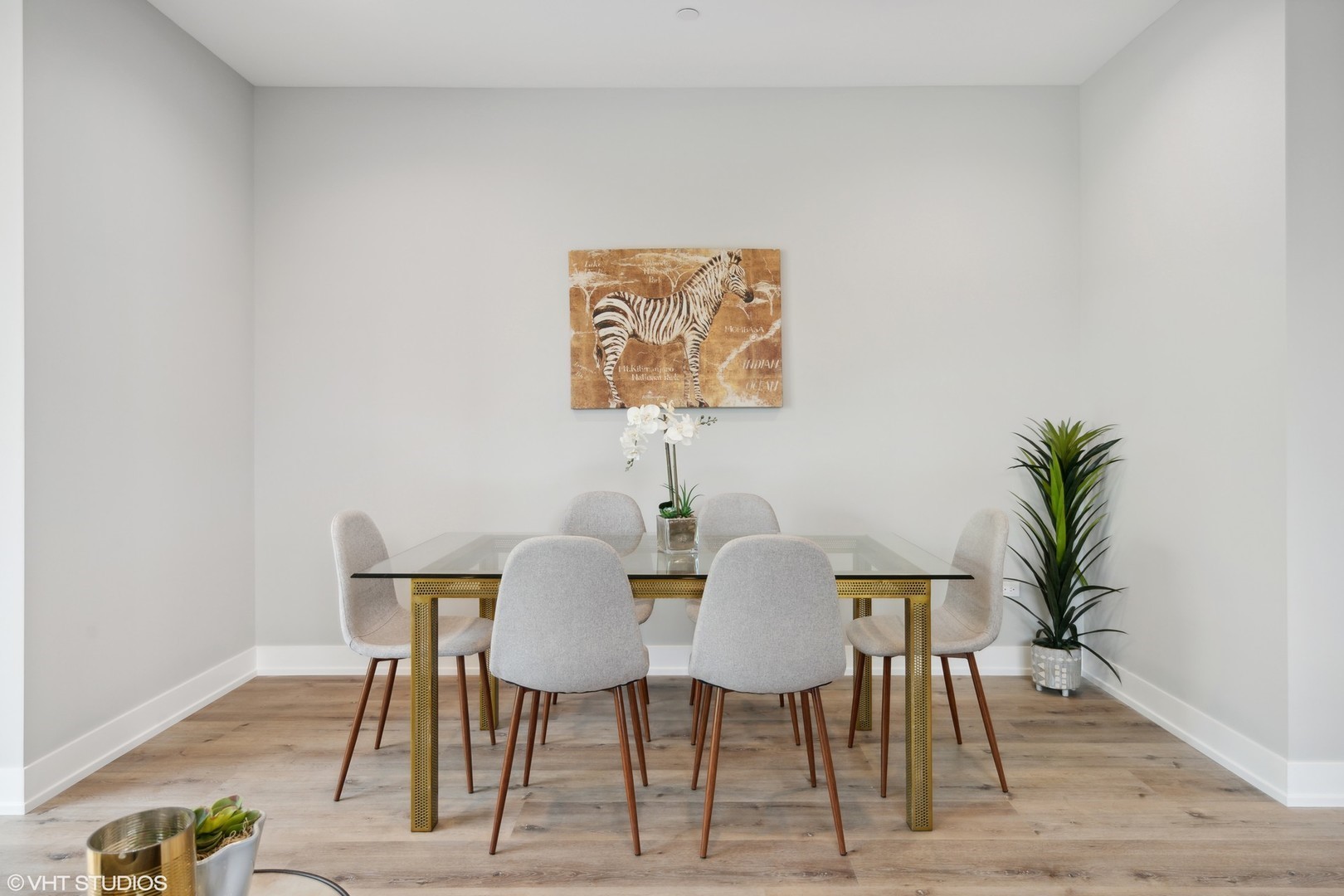 3335-3341 North Sheffield Avenue Chicago, IL 60657 - Photo 31 of 76 a view of a dining room with furniture and wooden floor