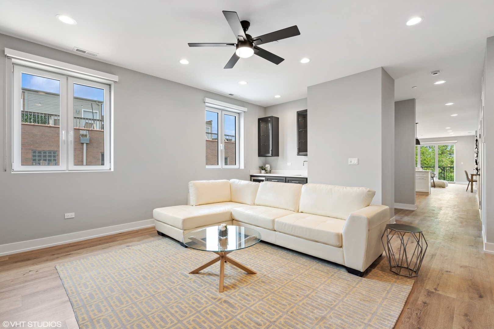 3335-3341 North Sheffield Avenue Chicago, IL 60657 - Photo 33 of 76 a living room with furniture and a large window