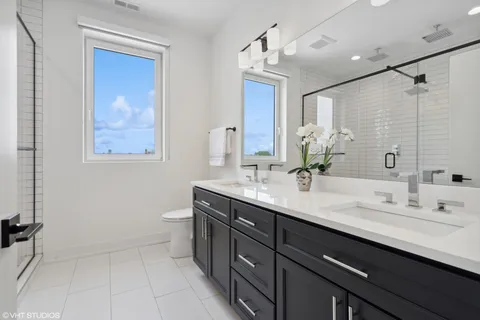 a kitchen that has a sink and a stove