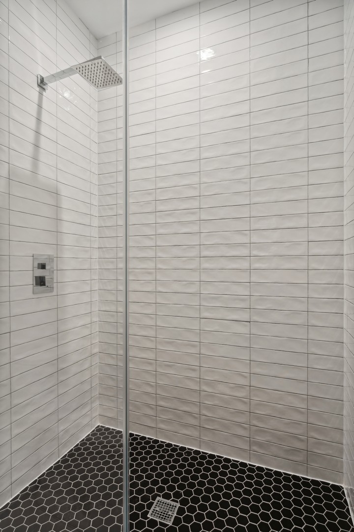 3335-3341 North Sheffield Avenue Chicago, IL 60657 - Photo 71 of 76 a bathroom with a shower