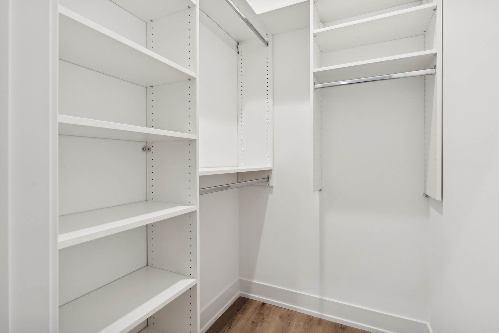 3335-3341 North Sheffield Avenue Chicago, IL 60657 - Photo 72 of 76 a view of walk in closet with empty racks