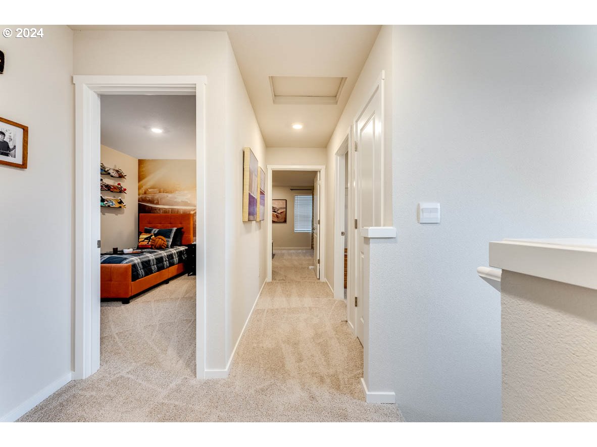 17406 Northwest 9th Avenue Ridgefield, WA 98642 - Photo 15 of 25 a view of a hallway view with living room and furniture