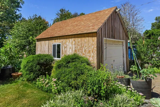 a view of a house with garden