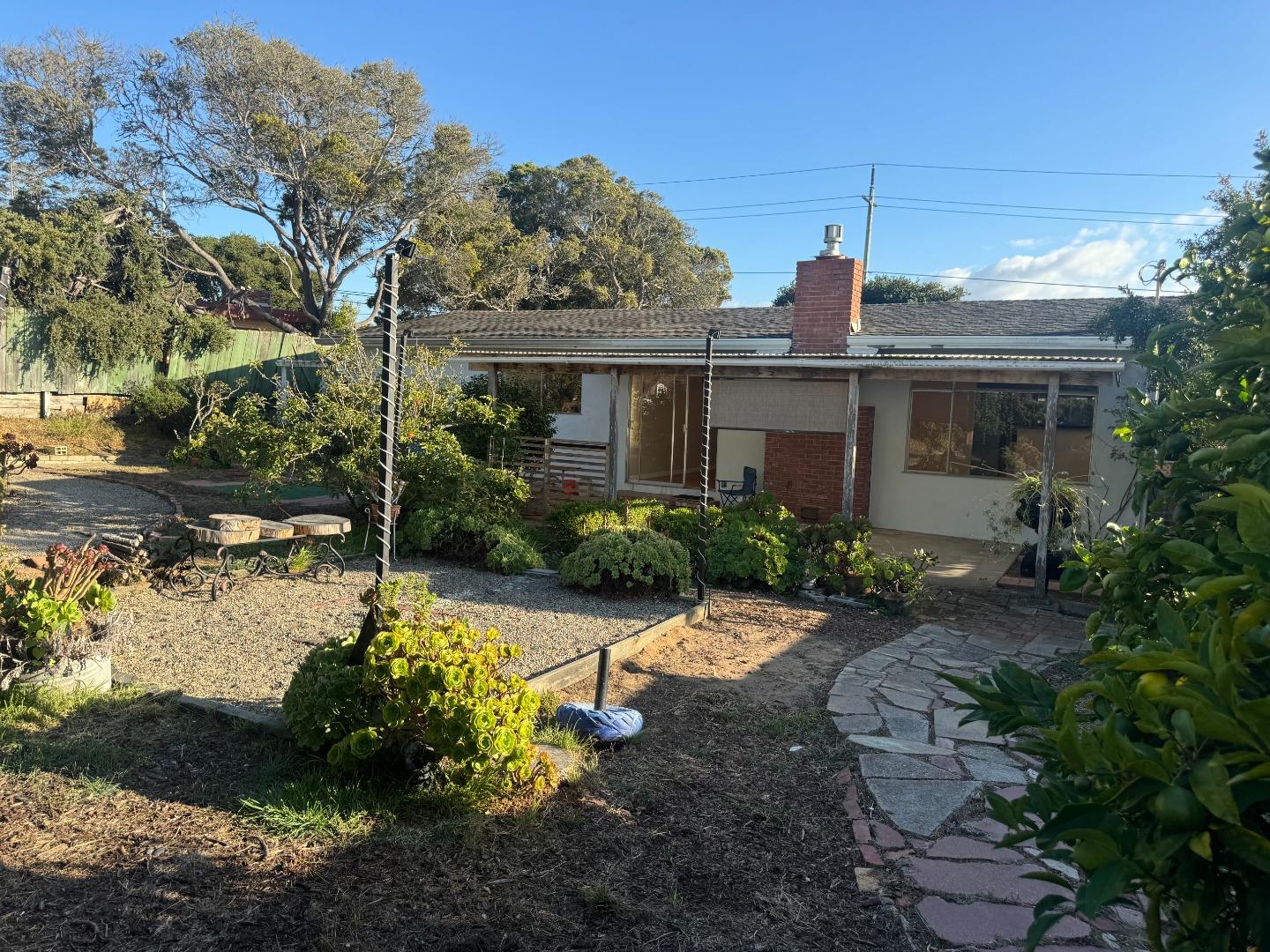 1373 Kimball Avenue Seaside, CA 93955 - Photo 11 of 13 a view of a garden with a house