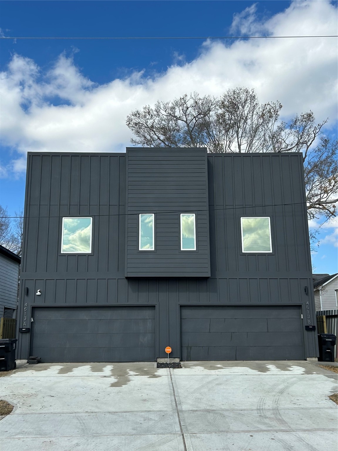 a front view of a house with parking
