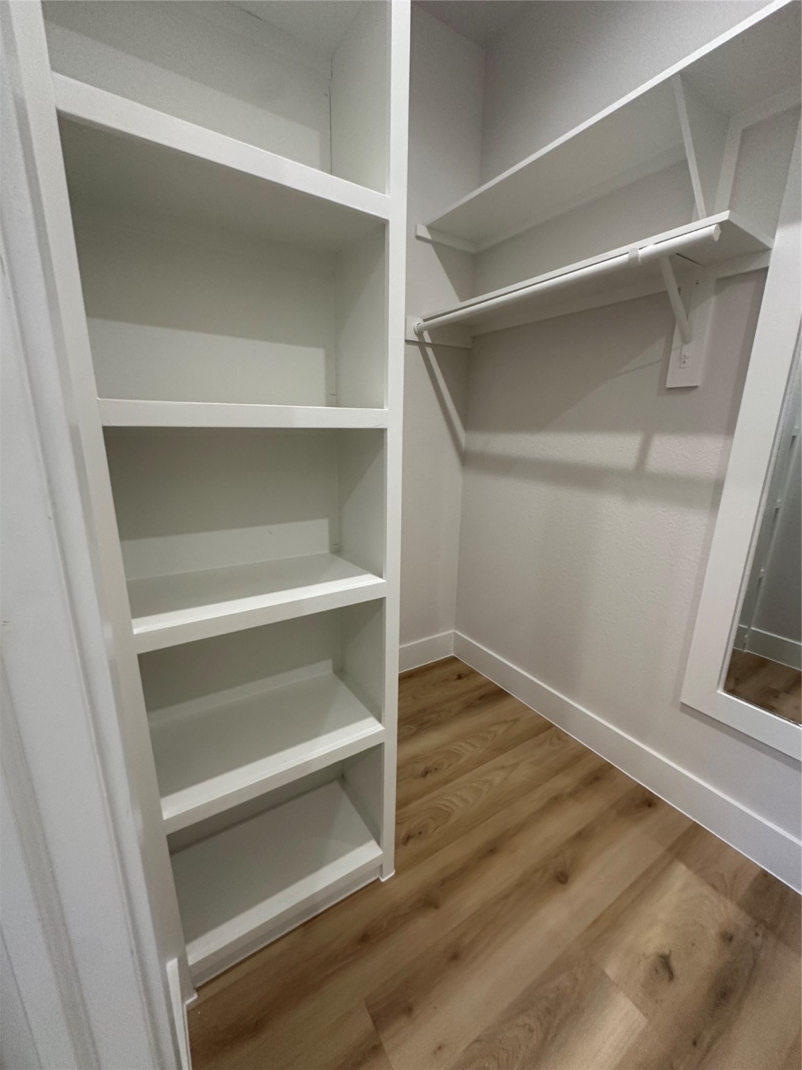 4513 Reed Road, Unit B Houston, TX 77051 - Photo 20 of 29 a view of walk in closet with empty racks