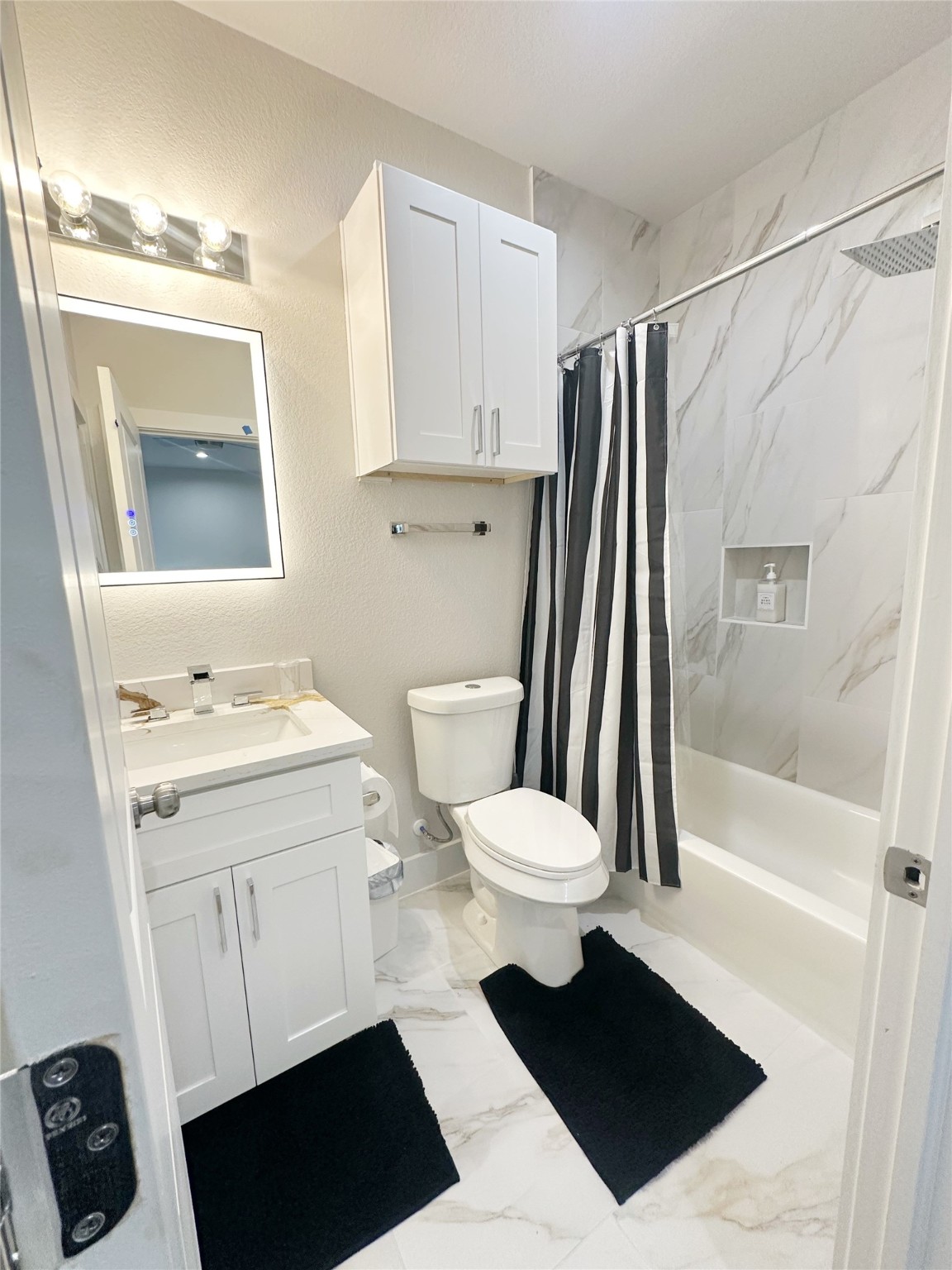 4513 Reed Road, Unit B Houston, TX 77051 - Photo 24 of 29 a bathroom with a sink toilet and shower
