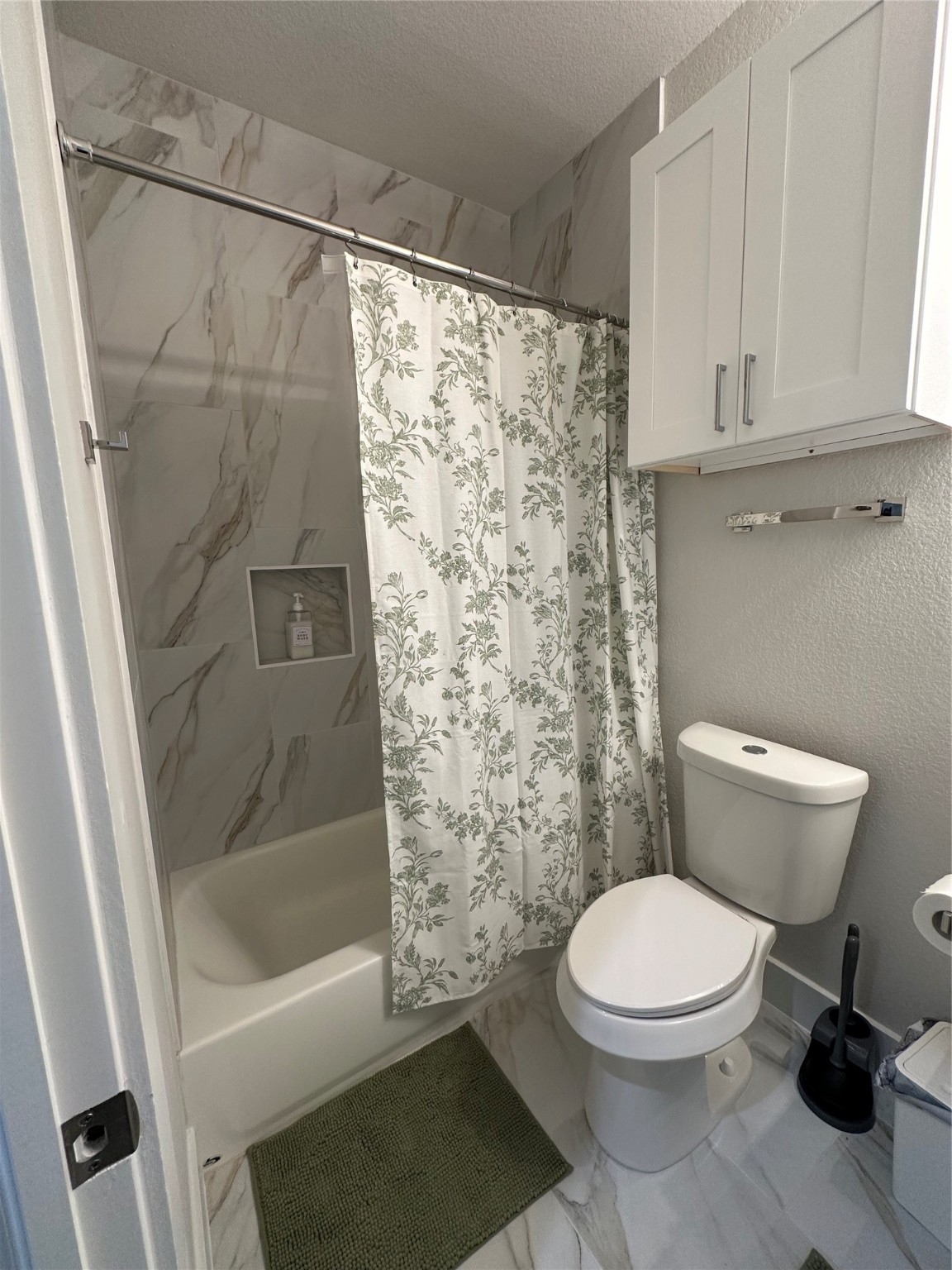 4513 Reed Road, Unit B Houston, TX 77051 - Photo 26 of 29 a bathroom with a toilet and a shower