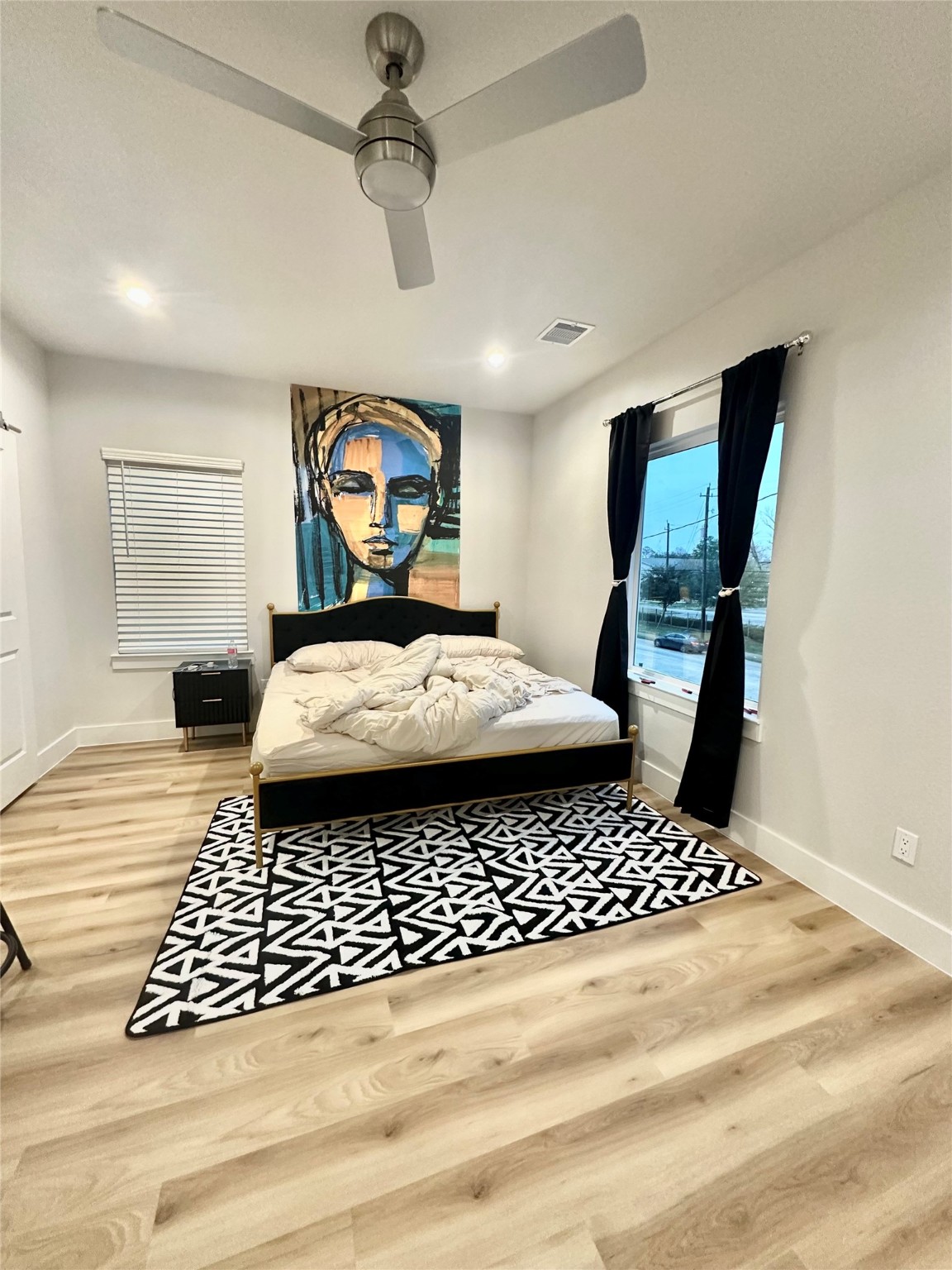 4513 Reed Road, Unit B Houston, TX 77051 - Photo 10 of 29 a bedroom with a bed and a window