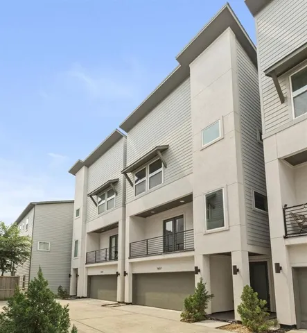 a view of a house with a street