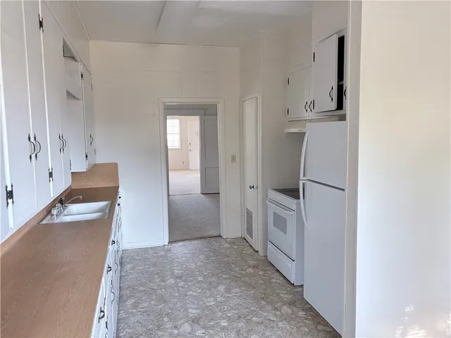 an empty room with a door