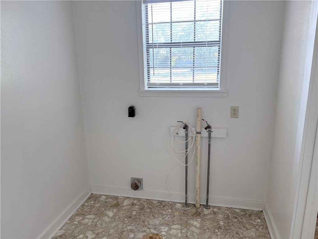 10356 Main Street Somerville, TX 77879 - Photo 13 of 19 an empty room with a door