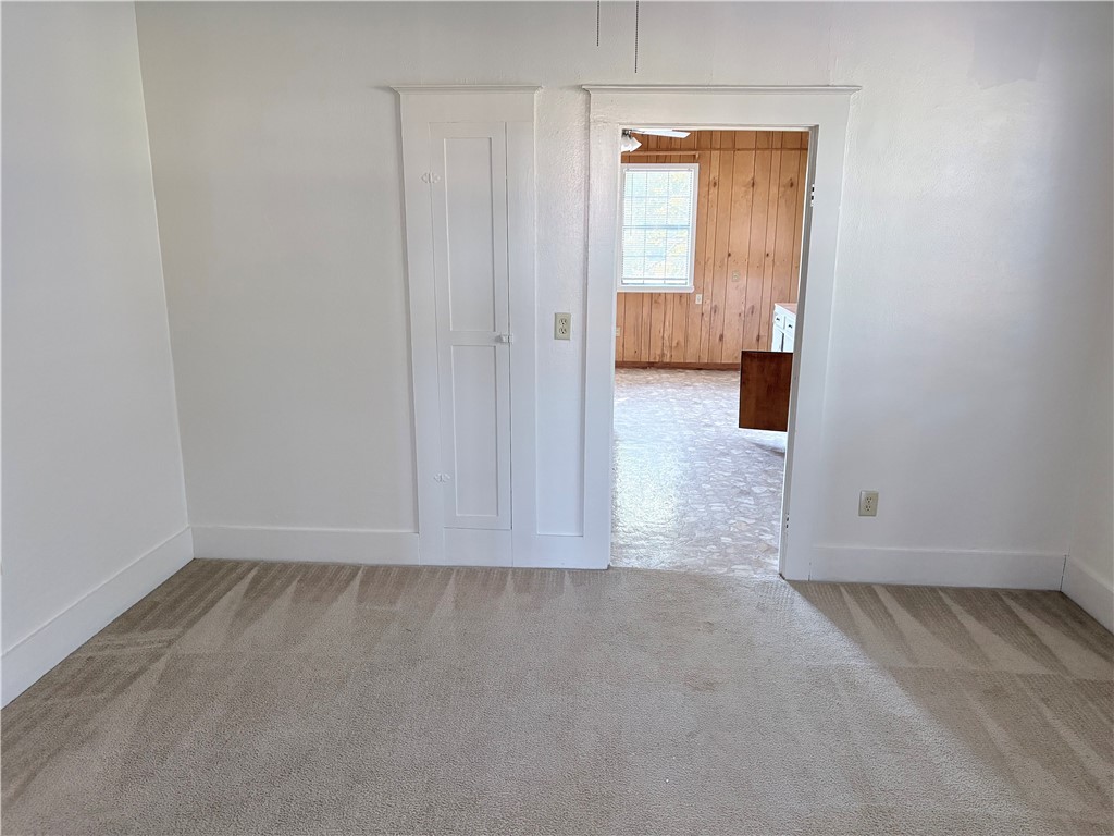 10356 Main Street Somerville, TX 77879 - Photo 6 of 19 a view of an empty room with a window