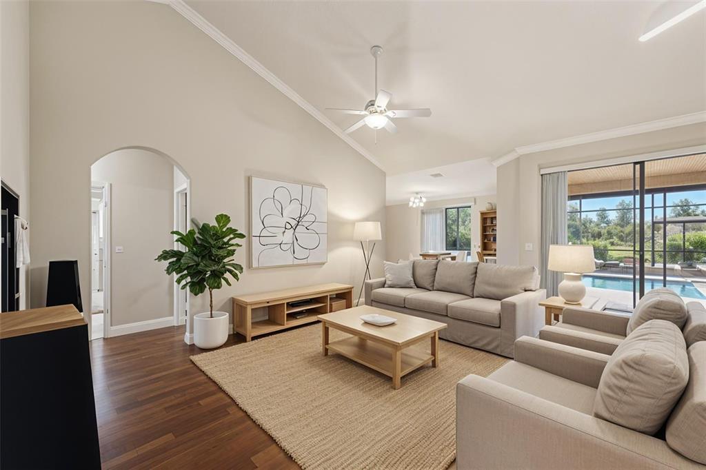 2002 Palm View Road Sarasota, FL 34240 - Photo 11 of 34 a living room with furniture potted plant and a window